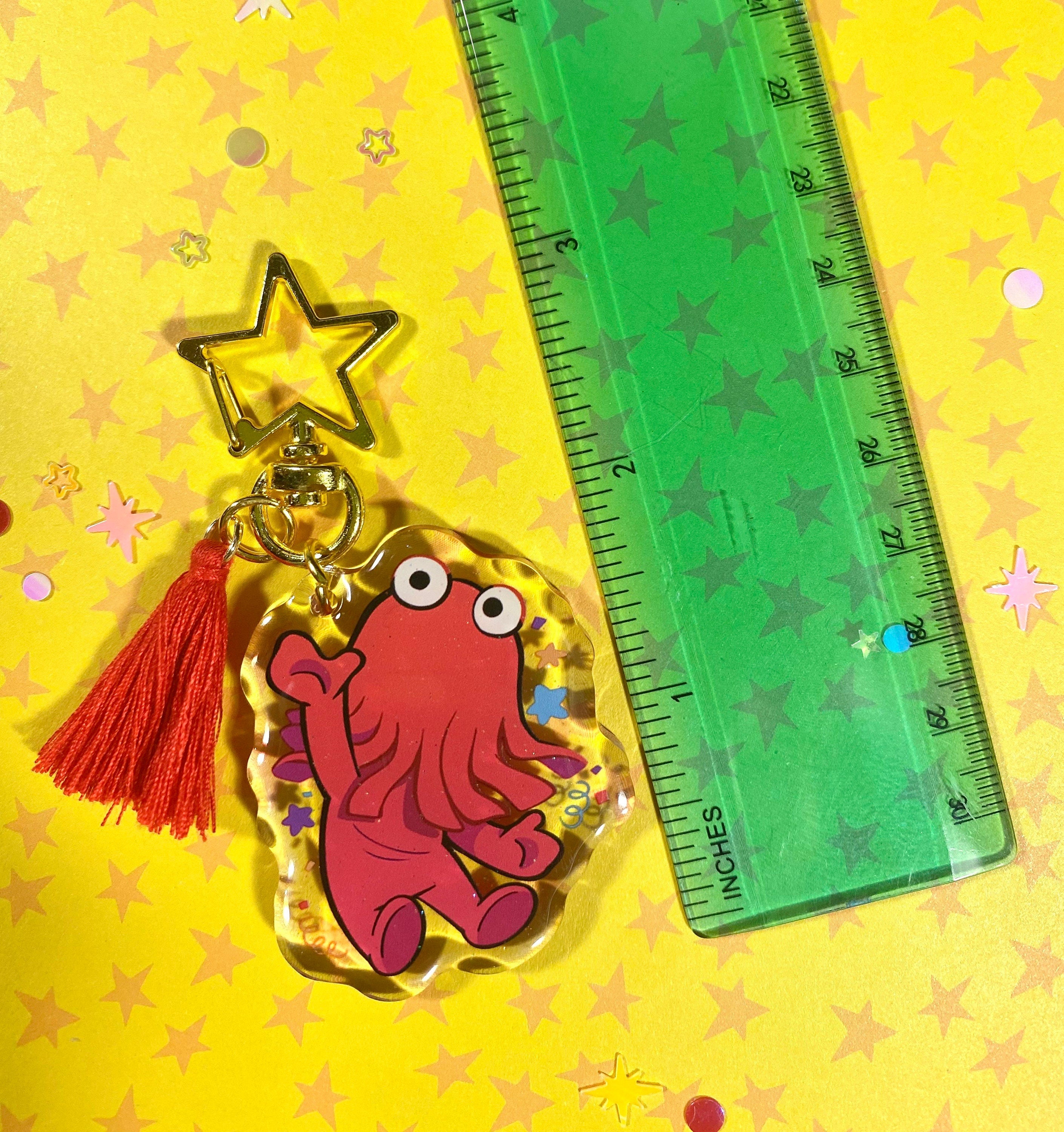 Red Guy Glitter Keychain